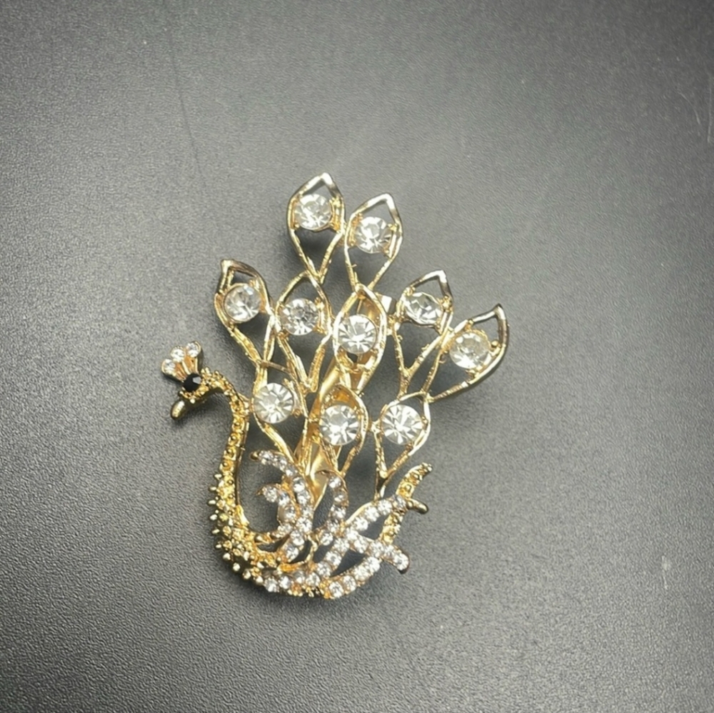 Modern peacock brooch